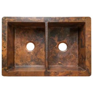 Undermount Split Copper Kitchen Sink — Hand-Hammered, artisan-crafted and hand-hammered by Monte Grande in Santa Clara del Cobre, Mexico.