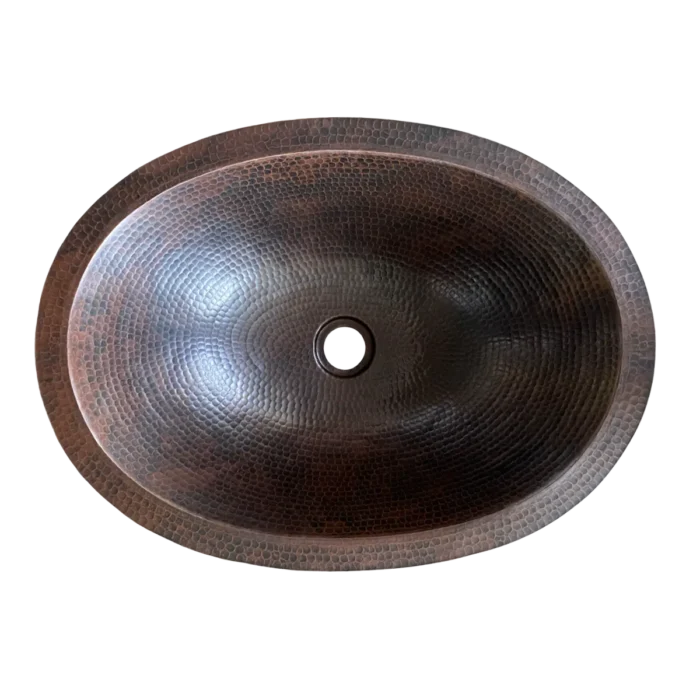 Oval Copper Undermount Bathroom Sink — Handcrafted Elegance, artisan-crafted and hand-hammered by Monte Grande in Santa Clara del Cobre, Mexico.