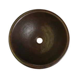 Round drop-in copper bathroom sink, artisan-crafted and hand-hammered by Monte Grande in Santa Clara del Cobre, Mexico.