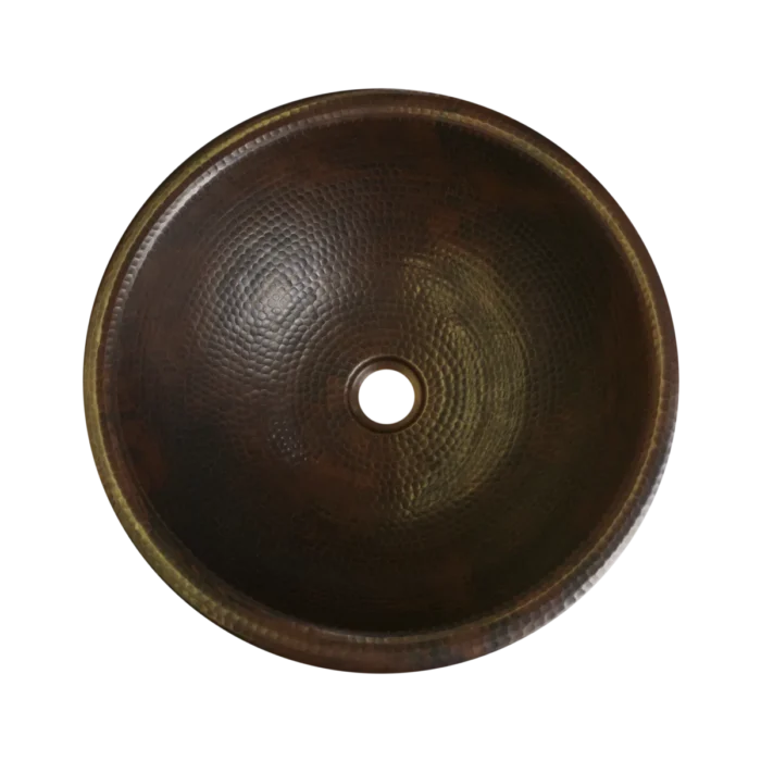 Round drop-in copper bathroom sink, artisan-crafted and hand-hammered by Monte Grande in Santa Clara del Cobre, Mexico.