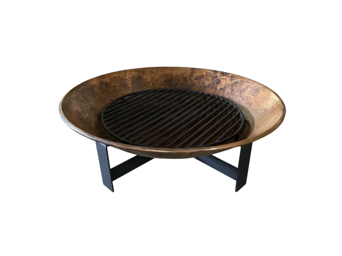 Handcrafted 38-inch copper fire pit with steel base and removable grate – front view.