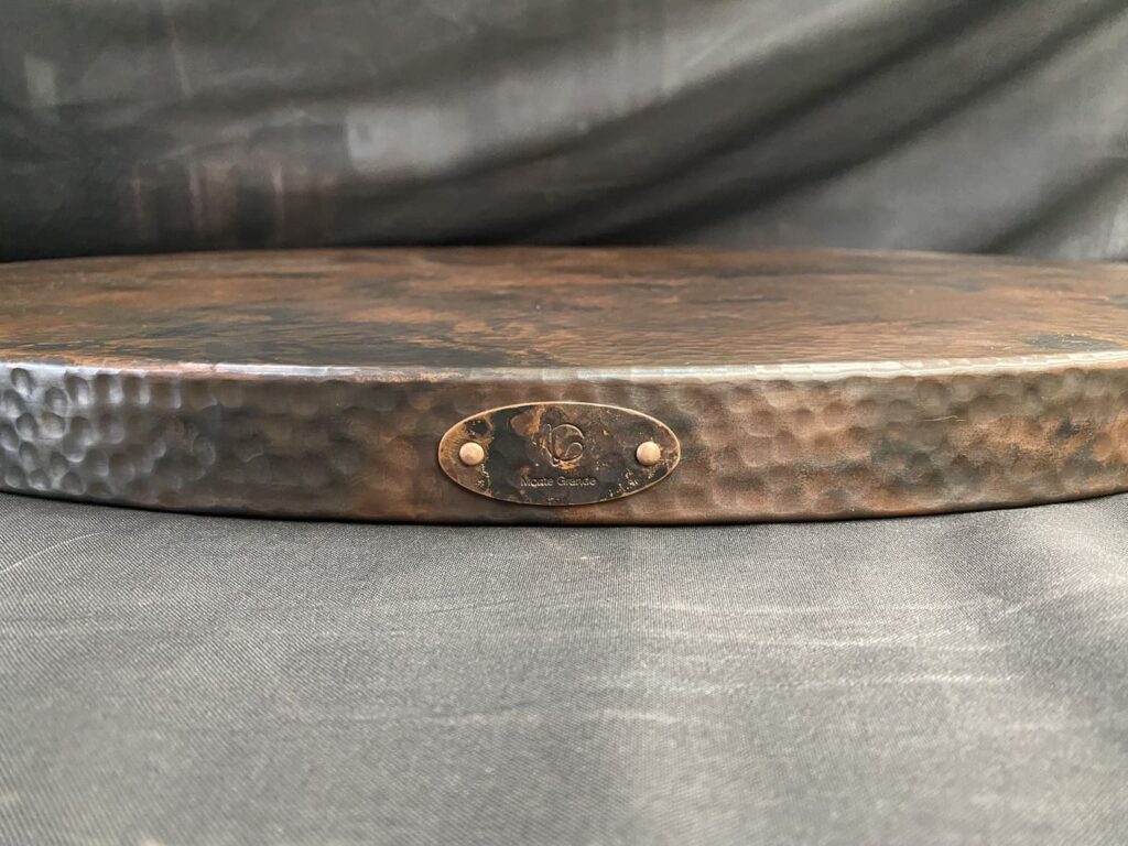 Large custom copper bar top under fabrication for a hospitality project