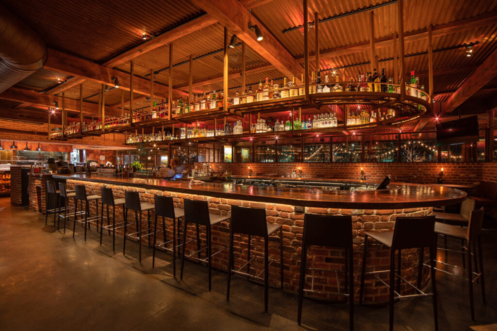 Custom copper surfaces coordinated across the Sierra Restaurant hospitality interior